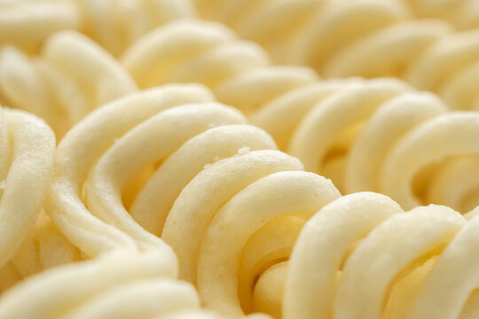 dry instant noodles texture background close up