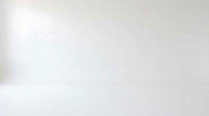 Minimalist seamless white studio wall backdrop for clean product photography and professional shoots © Danish