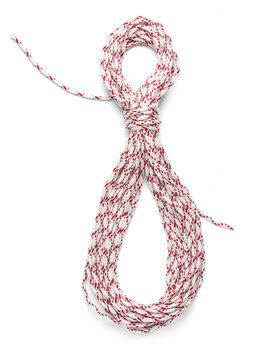 White and red braided nylon rope coil isolated on white background, vertical