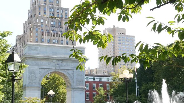 New York City Manhattan Washington Square Park arch, United States. Marble historic monument Greenwich Village. 5 fifth avenue triumphal arch. Autumn fall garden greenery. George Washington memorial.