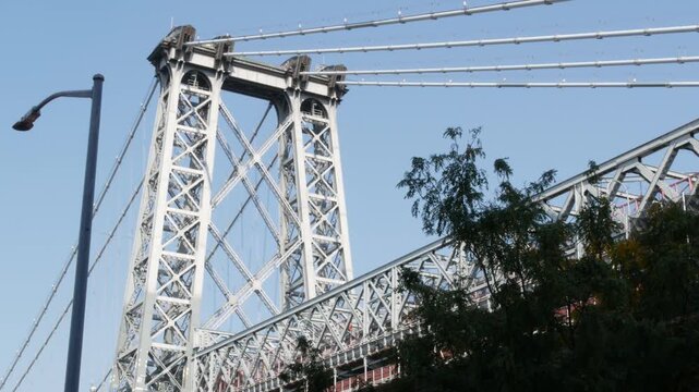 Williamsburg Bridge in Brooklyn, New York City, United States. Transport metallic bridge near Marcy Av subway station and Domino park in Williamsburg.