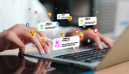 Fototapeta na wymiar Digital marketing professional using a laptop with social media notifications, likes, comments, and reactions, representing online engagement, social networking, content marketing, and communication.
