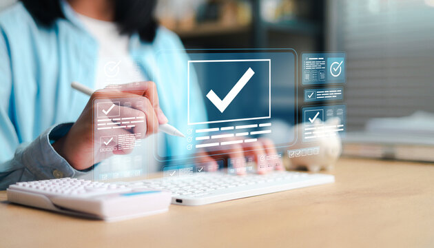 Person using a laptop and digital checklist interface, representing task management, quality control, workflow approval, productivity, compliance, business operations, and modern technology.