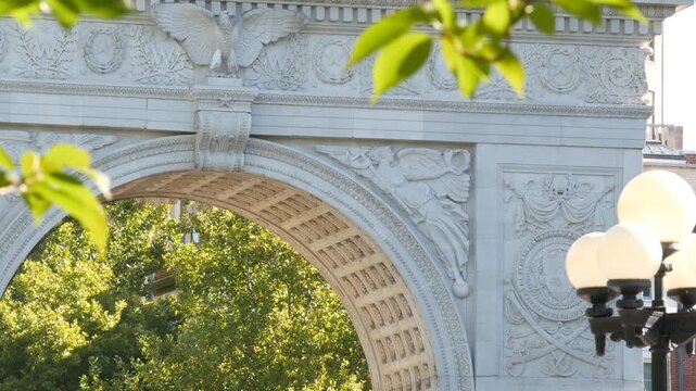 New York City Manhattan Washington Square Park arch, United States. Marble historic monument Greenwich Village. 5 fifth avenue triumphal arch. Autumn fall garden greenery. George Washington memorial.