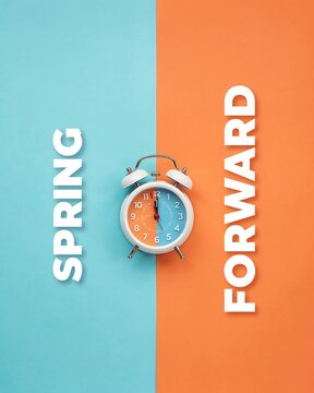Spring Forward Daylight Saving Time Concept with Alarm Clock