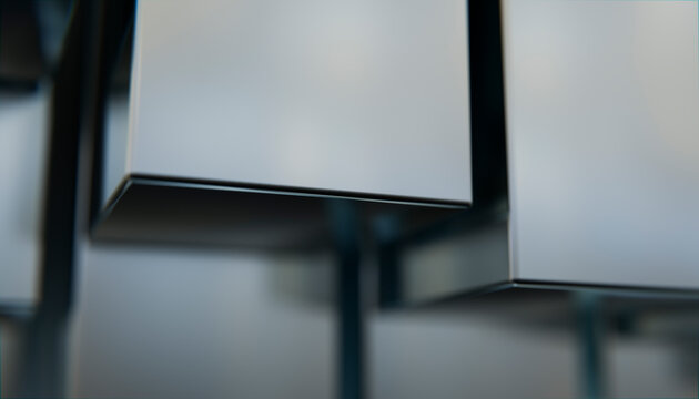 Close-up of stacked metallic rectangular boxes with smooth surfaces