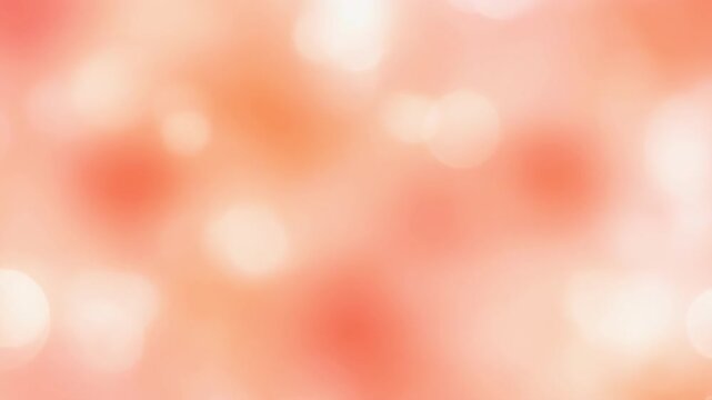 Soft peach and white bokeh light background with circular blurred spots