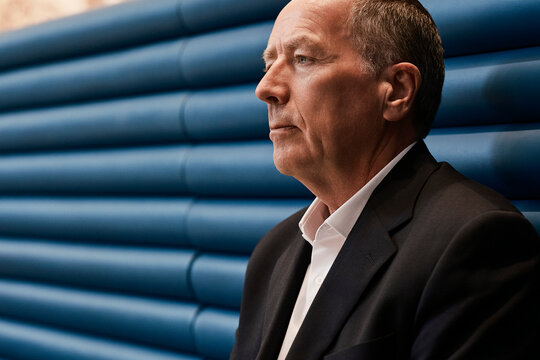 Businessman in suit attends a business meeting
