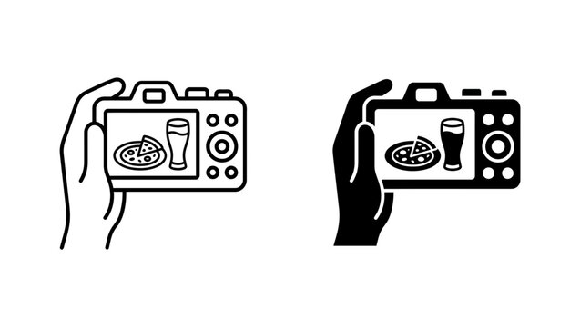 Hand holding digital camera capturing food and beverage icons