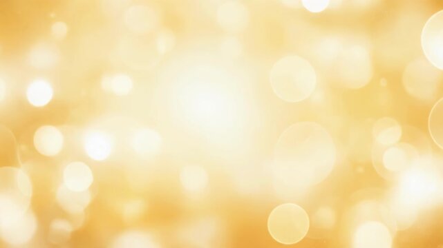 Soft golden bokeh light background with bright circular highlights