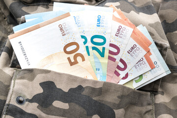 Obraz premium Cash for the military, euro banknotes. 