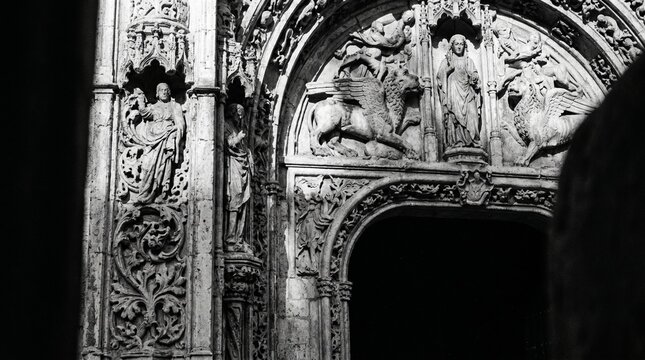 Intricate Gothic Stone Carvings in Cathedral Archway.