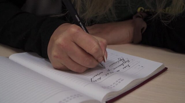 Woman Journaling Personal Thoughts for Self Reflection
