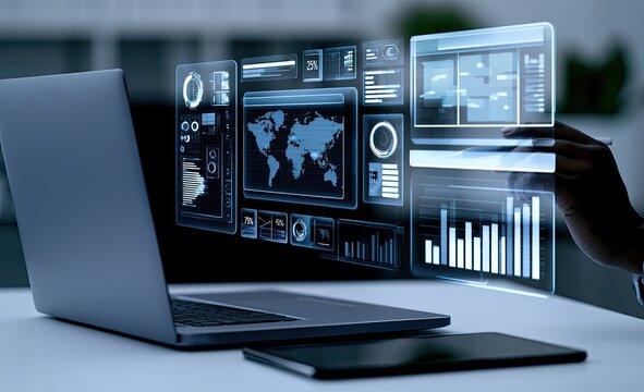 Holographic data visualization interfaces float above a laptop and tablet