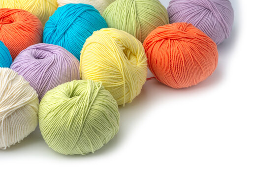 Colorful yarn balls isolated on white