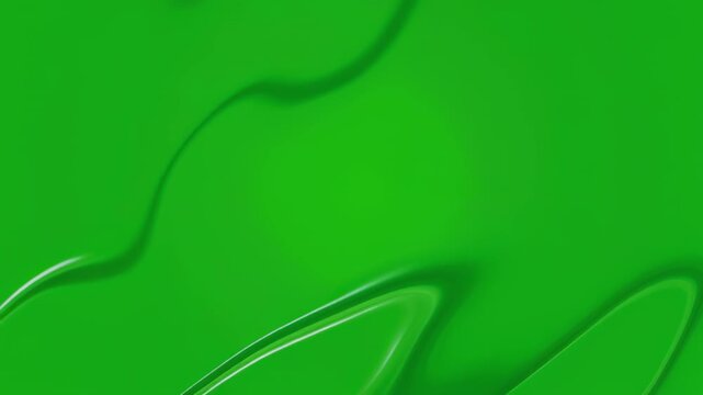 Vibrant green liquid flowing smoothly with subtle light reflections and organic wave patterns on a dark background