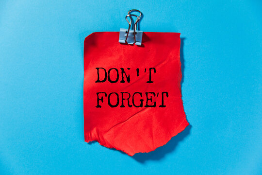 Don't Forget handwritten message on sticky note
