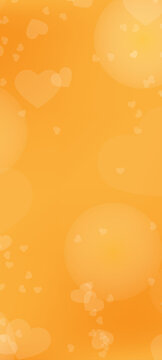Orange-yellow background with blurred elements. Transparent hearts on an orange background. Wallpaper for lockscreens, banners, posters, and other themed designs