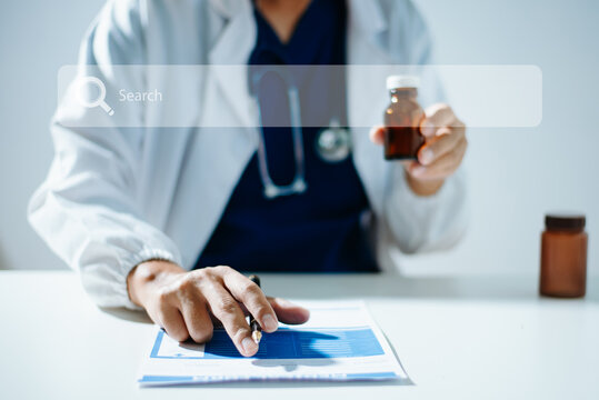 A healthcare professional reviews prescriptions and medical records with a digital search overlay. Ideal for pharmacy