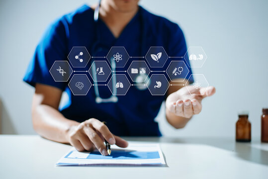 Doctor or scientist using a tablet with AI, science, and medical icons for research, diagnosis, and innovation in health technology.