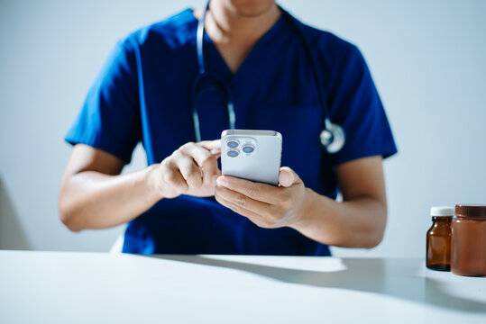 Professional healthcare worker calculating finance and budget data on a calculator. Medical accounting for cost analysis