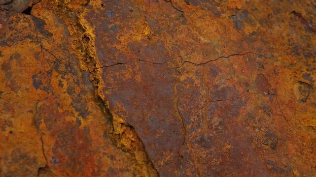 Rusty Metal Surface with Flaking Paint Chips Close Up Texture Background
