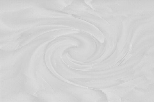 Swirling white cream texture with circular motion and soft shadows, abstract background, cosmetic