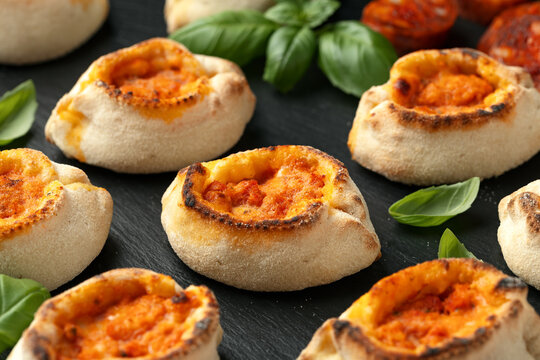 Italian Salami Pizza Bites on stone board