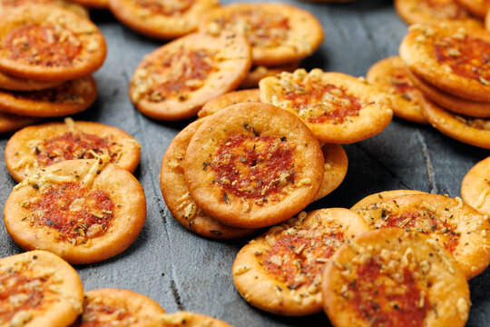 Mini Pizza Crackers with Tomato and Herbs Background