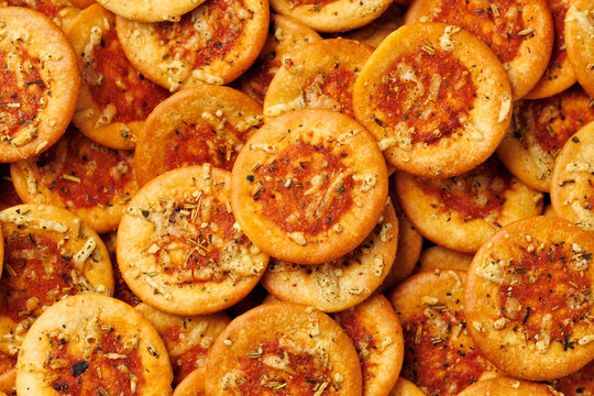 Mini Pizza Crackers with Tomato and Herbs Background