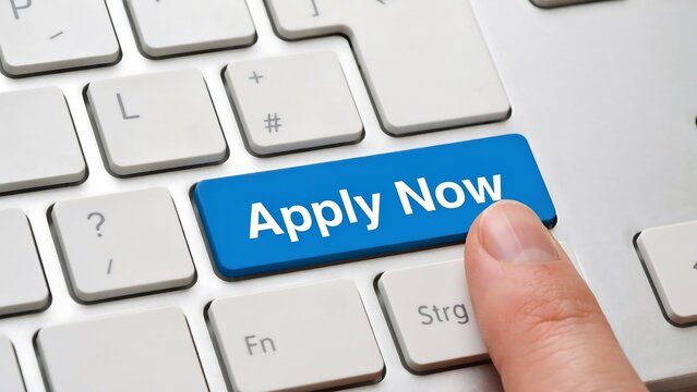 Apply now button on computer keyboard representing job application and recruitment