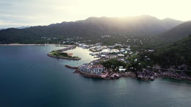 Aerial orbiting Nelly Bay on Magnetic Island, sunrise, Australia