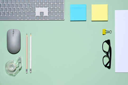Office items on green background
