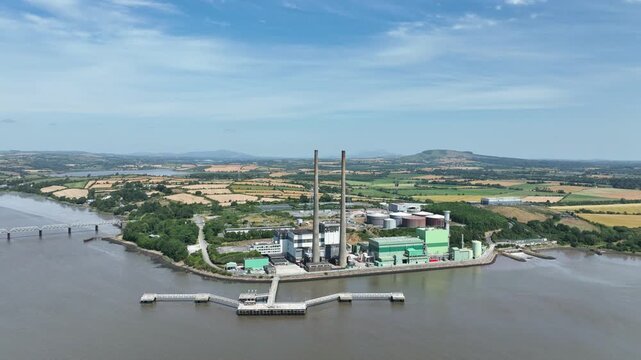 Power plant located on the River Suir in County Wexford, Ireland, filmed in crisp aerial detail for energy, engineering and environmental themes.