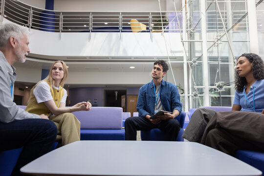 Group Discussion in Modern Workspace Setting