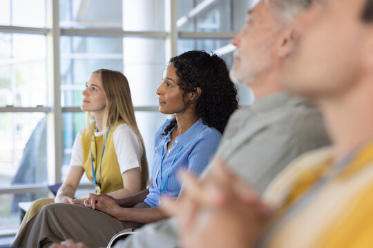 Diverse Group listening to a conference