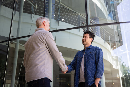 Handshake Between Two men outside of office