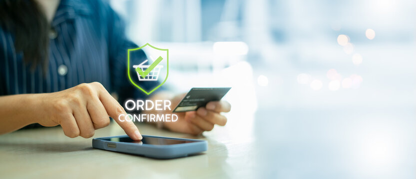 Customer confirming an online purchase on smartphone with order success icon.order confirmed,success,purchase,receipt,representing e-commerce completion,digital payment and retail transaction concept