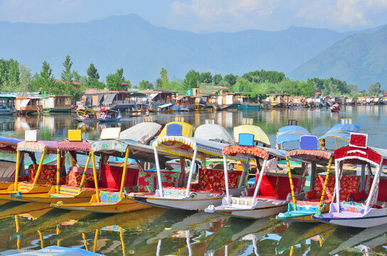 Kasmir with Dal freshwater lake in the city of Srinagar with Houseboats and shikaras on the lake, India