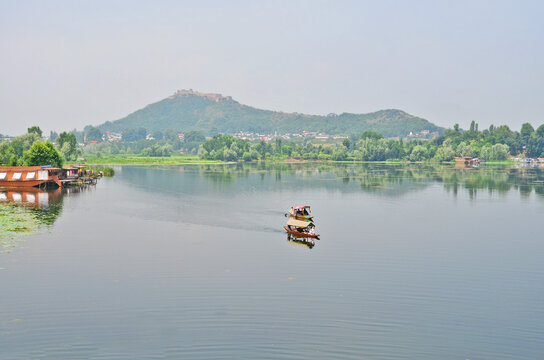 Kasmir with Dal freshwater lake in the city of Srinagar with Houseboats and shikaras on the lake, India