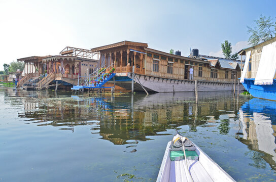Kasmir with Dal freshwater lake in the city of Srinagar with Houseboats and shikaras on the lake, India
