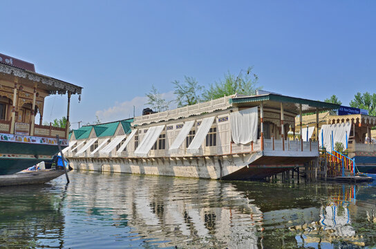 Kasmir with Dal freshwater lake in the city of Srinagar with Houseboats and shikaras on the lake, India