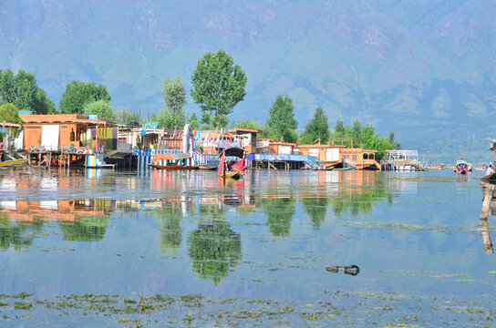 Kasmir with Dal freshwater lake in the city of Srinagar with Houseboats and shikaras on the lake, India