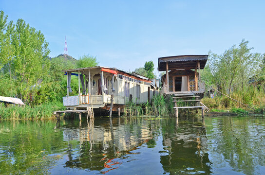 Kasmir with Dal freshwater lake in the city of Srinagar with Houseboats and shikaras on the lake, India