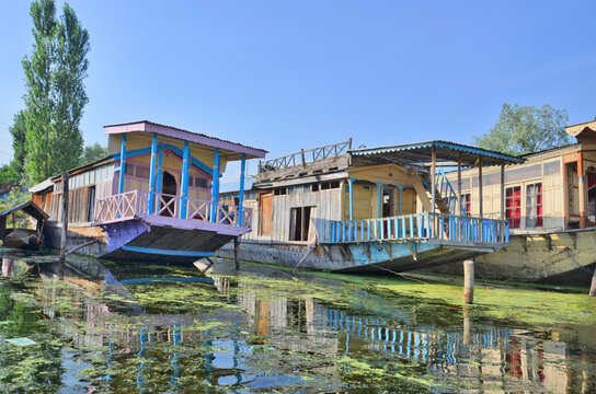 Kasmir with Dal freshwater lake in the city of Srinagar with Houseboats and shikaras on the lake, India