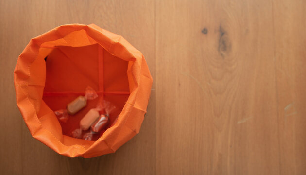 Nearly Empty Halloween Treat Bag on Floor
