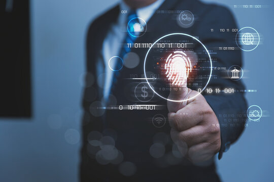Futuristic Businessman Authenticating Security Access with Biometric Fingerprint Scanner.