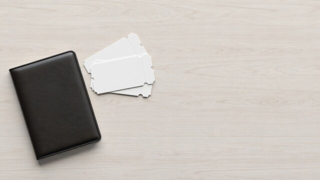 Minimalist Overhead Shot of a Black Leather Wallet and Blank White Cards on a Light Beige Background.