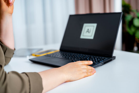 Professional working with artificial intelligence machine learning technology and data on laptop computer. Creative digital artist profession modern technology.