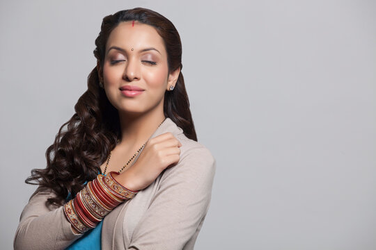 Married woman with bangles smiling